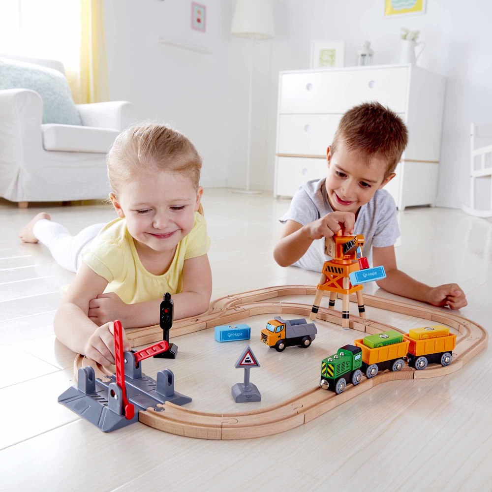 Hape - 32pc Wooden Train Cargo Railroad Yard - Crossing & Crane Set - Image 2